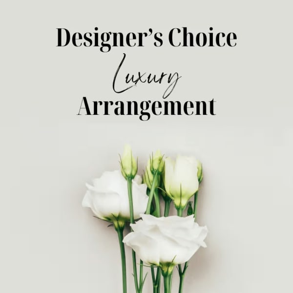 White lisianthus stems with buds on a light background beneath the text “Designer’s Choice Luxury Arrangement”.
