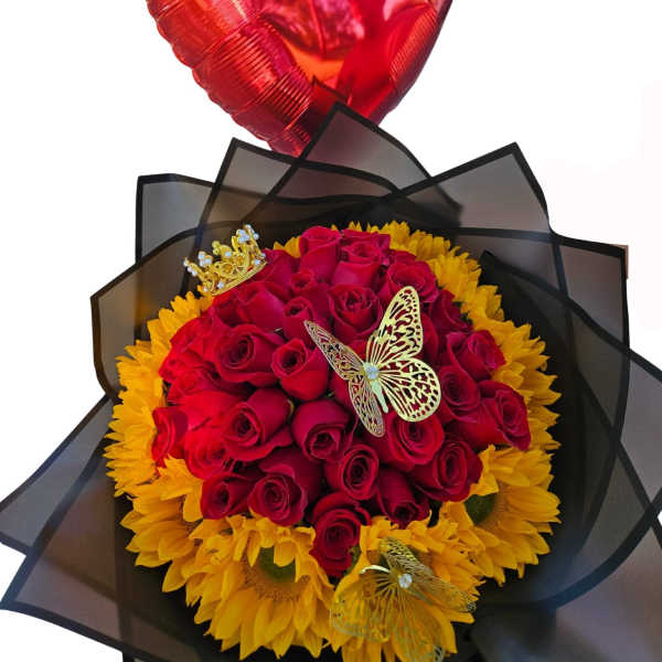 Bouquet of red roses and yellow sunflowers with a heart balloon