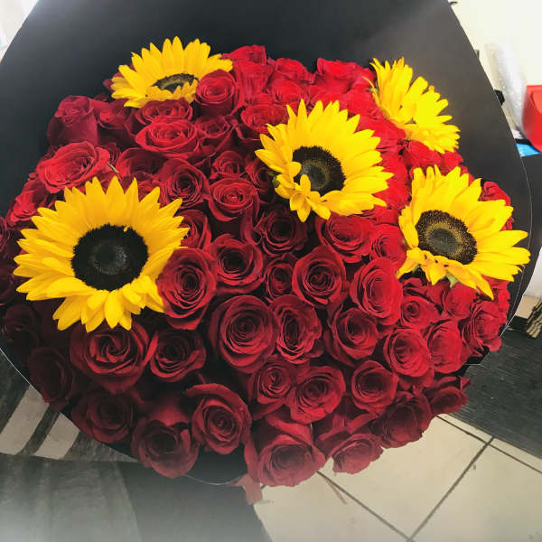 6 Dozen red roses & 5 sunflowers