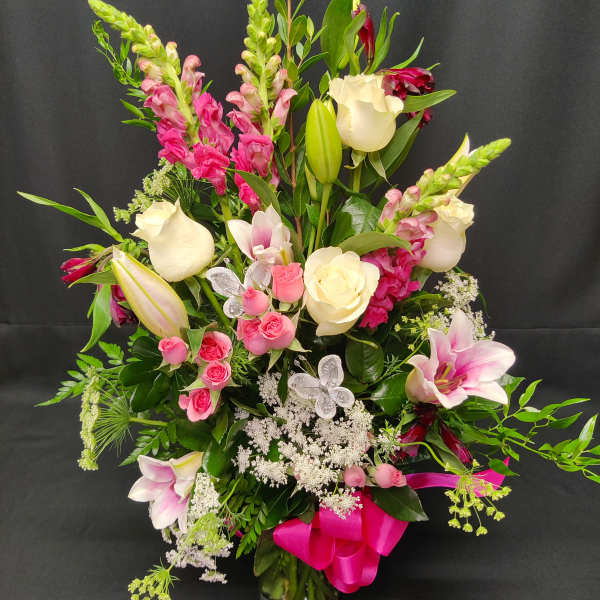 Oriental lilies with roses and butterflies