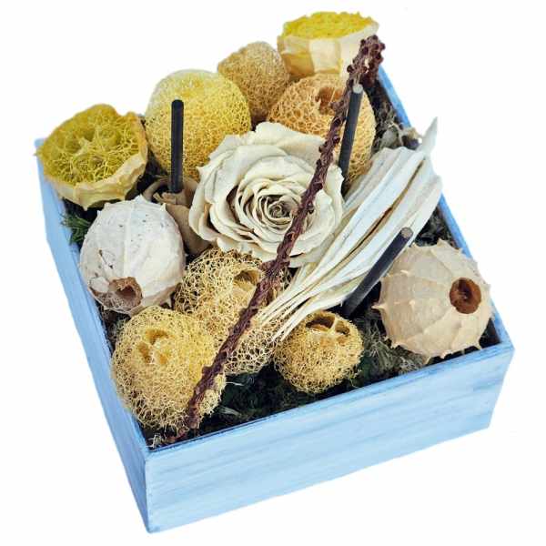Dried flower arrangement in a blue wooden box