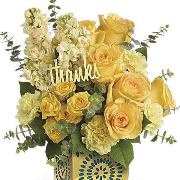 Yellow roses and cream flowers in a decorative box with a "thanks" sign