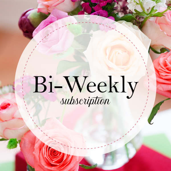 Mixed pink and white roses with a "Bi-Weekly subscription" label