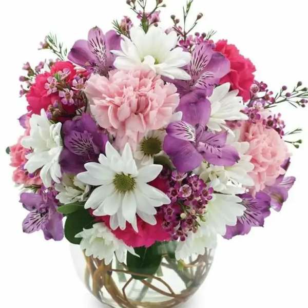 Pink, purple, and white mixed bouquet in a clear glass vase