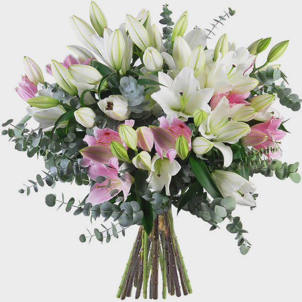 Bouquet of white and pink lilies with eucalyptus