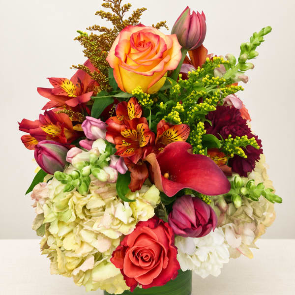 Colorful bouquet with roses, calla lilies, and hydrangeas