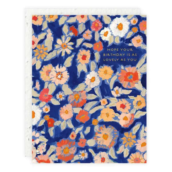 Floral birthday card with blue background and multicolored flowers