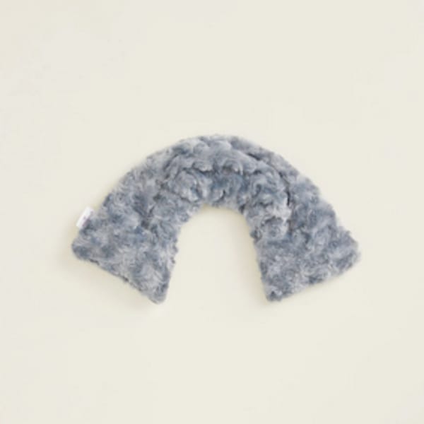 Gray fuzzy U-shaped plush item on a plain background