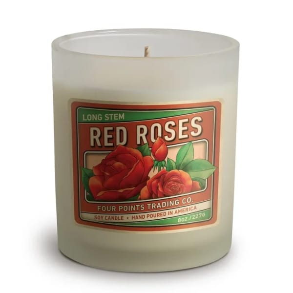 Frosted glass candle with a red roses label