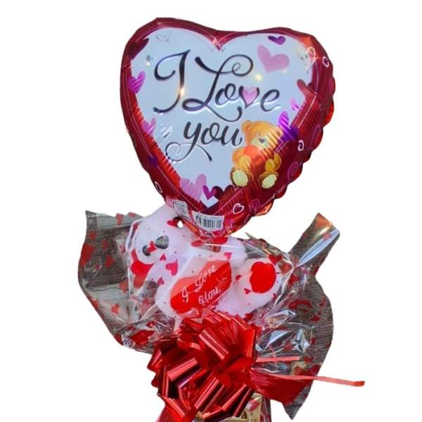 Heart-shaped "I Love You" balloon with a teddy bear and gift basket