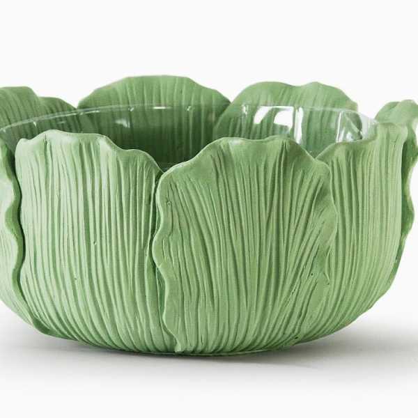 Green scalloped ceramic bowl with a textured petal-like exterior