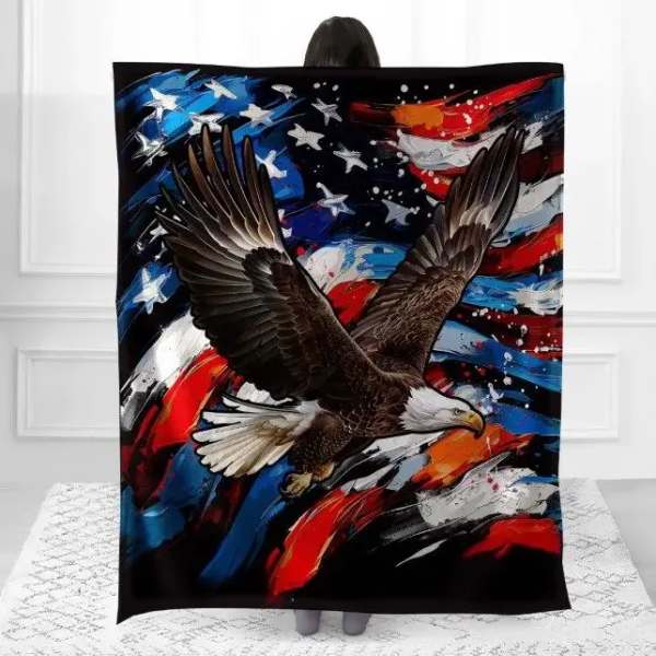 Person holding a blanket with an eagle and red, white, and blue design