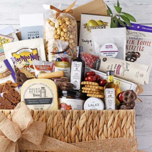 Gift basket filled with assorted gourmet snacks and packaged treats