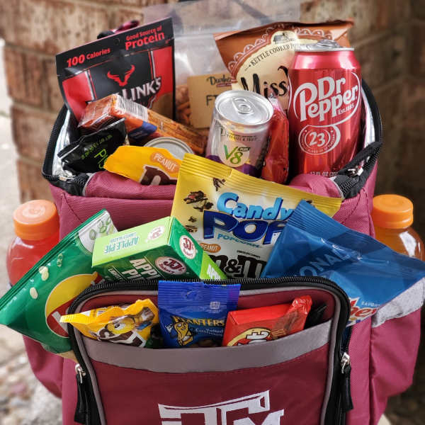 Texas A&M cooler bag filled with assorted snacks and drinks