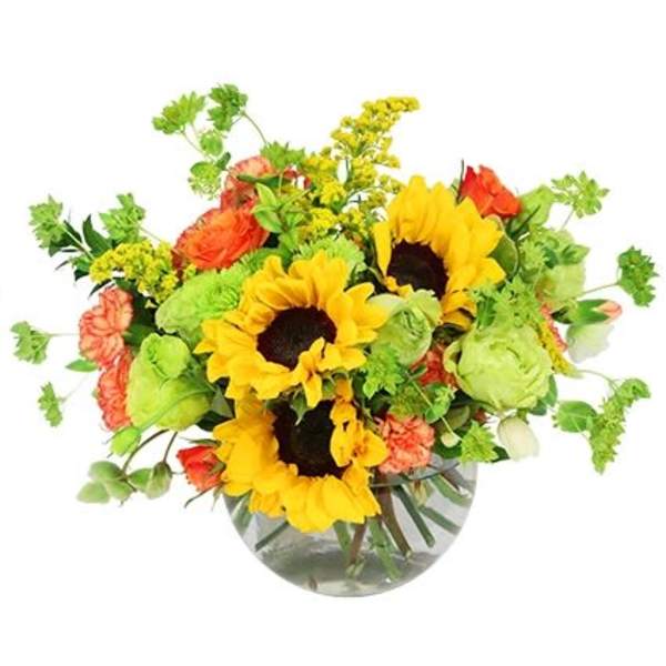 Sunflower bouquet with orange and green flowers in a glass vase