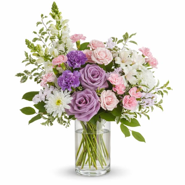 Lavender and pink bouquet in a clear glass vase