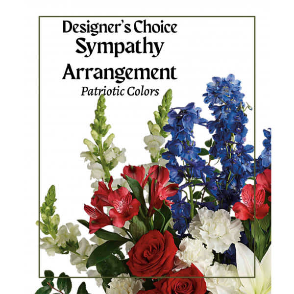 Designer’s Choice sympathy arrangement with red, white, and blue flowers