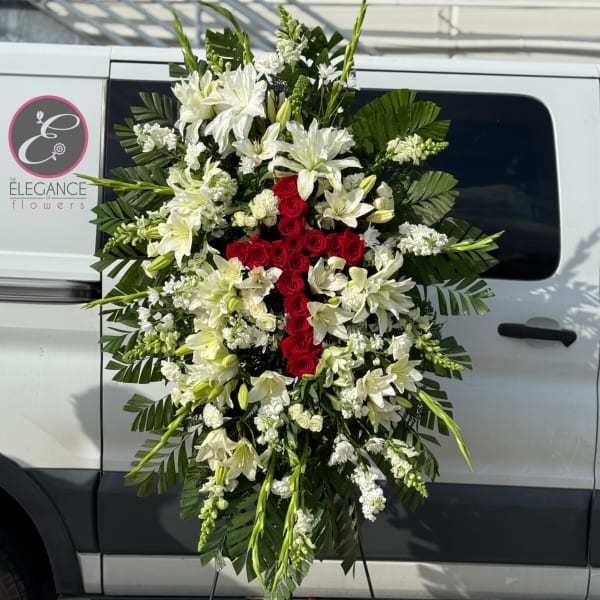 Large standing floral spray with white lilies and red roses