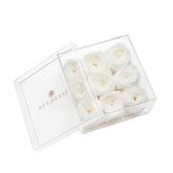 White roses in a clear gift box