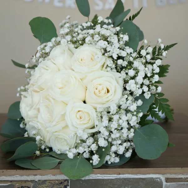 White rose bouquet with baby's breath and eucalyptus