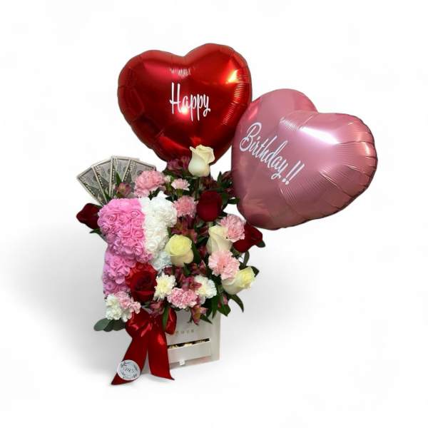 Heart balloons above a pink and white rose bouquet in a gift box