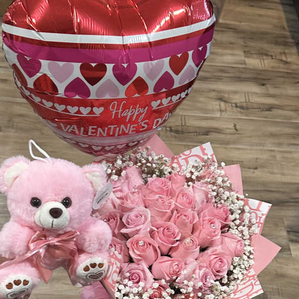 Pink rose bouquet with a teddy bear and heart-shaped Valentine balloon