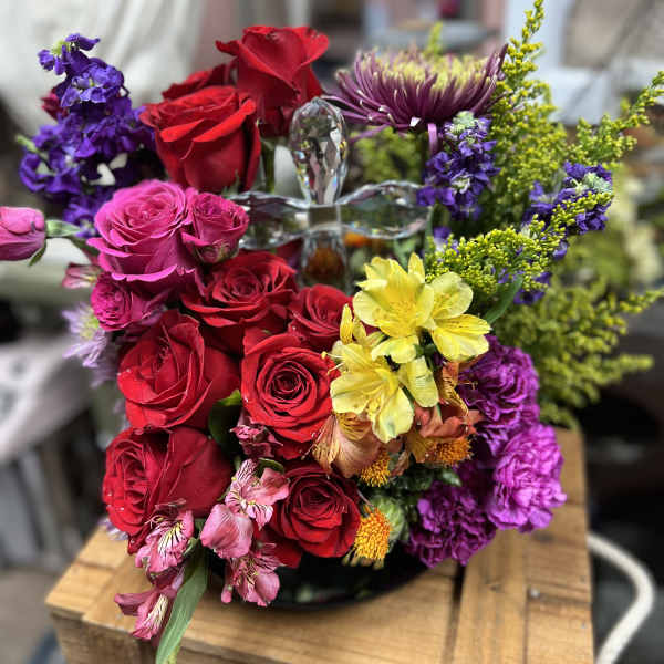 Colorful bouquet of roses, chrysanthemums, and purple filler flowers