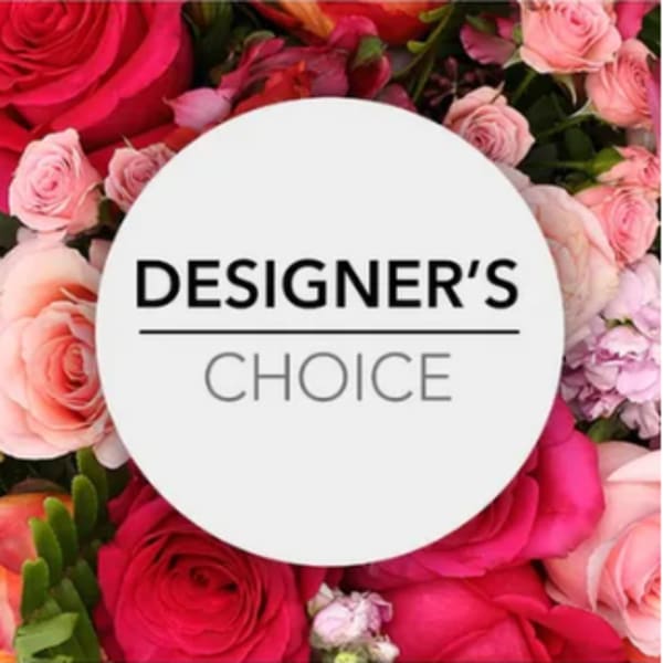 Pink and red roses surround a circular "Designer’s Choice" label
