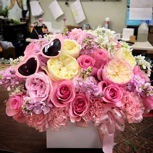 Pink and yellow rose bouquet with heart-shaped sunglasses