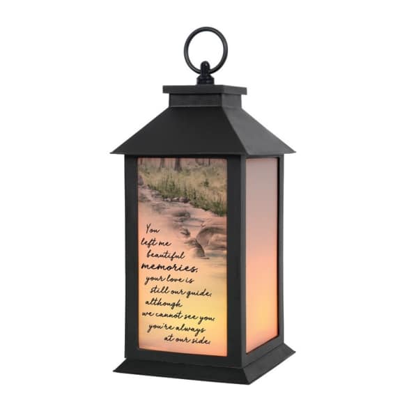 Black memorial lantern with a printed sympathy message and warm light panels