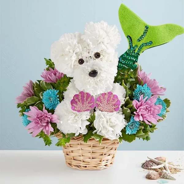 Dog-shaped flower arrangement in a wicker basket with a green fin tail