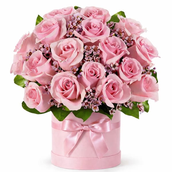 Pink rose bouquet in a round pink box with a satin ribbon