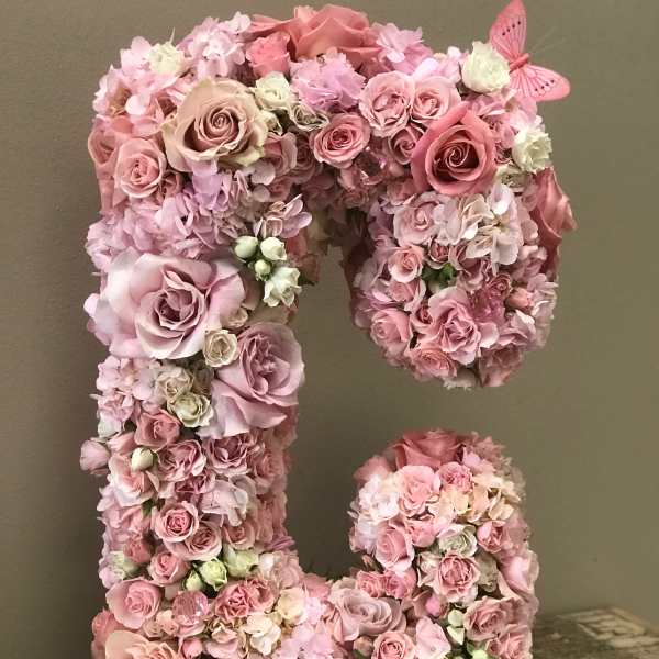 Pink floral letter arrangement with roses and hydrangeas