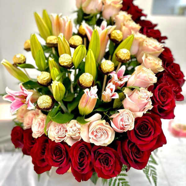 BASQUET ROSES LILIES AND CHOCOLATE