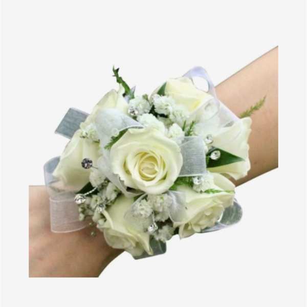 White rose wrist corsage with silver ribbon and small crystal accents