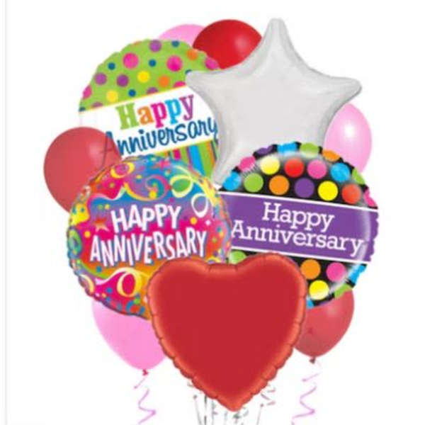 Cluster of colorful anniversary balloons with heart and star shapes