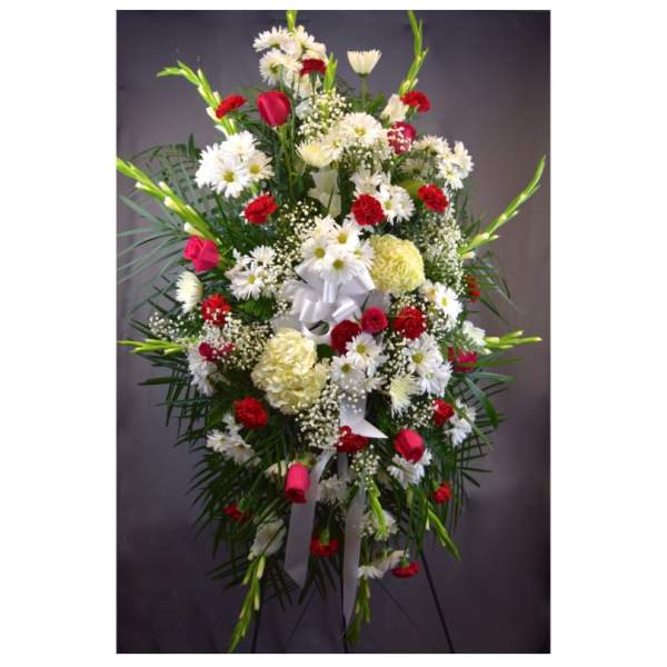 Standing floral spray with white daisies and red carnations