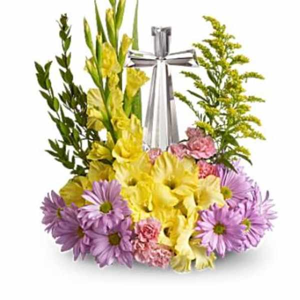 Yellow and purple floral arrangement with a silver ribbon centerpiece