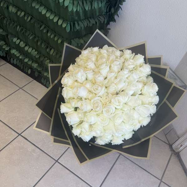 100 Hand wrapped Roses