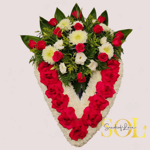 Heart-shaped floral spray with red roses and white chrysanthemums