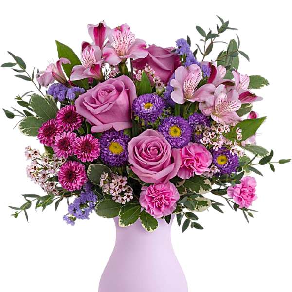 Pink and purple mixed bouquet in a lavender vase