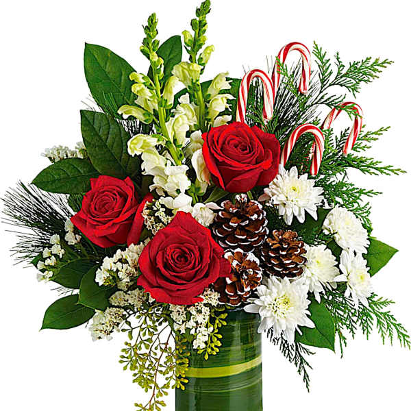 Red roses and white flowers in a green glass vase with candy canes