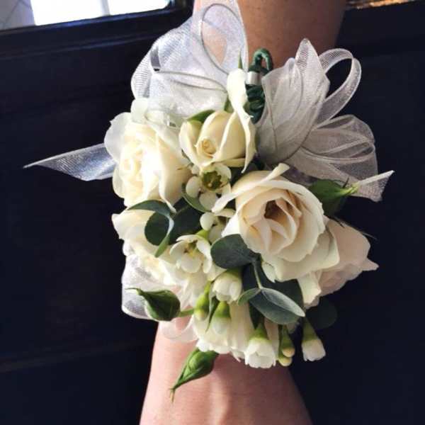 White rose wrist corsage with silver ribbon