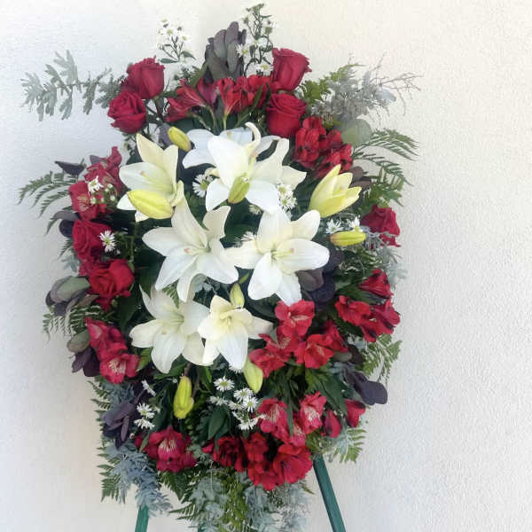 Standing floral spray with white lilies and red roses