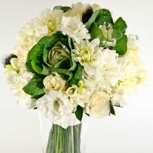 White floral bouquet in a clear glass vase