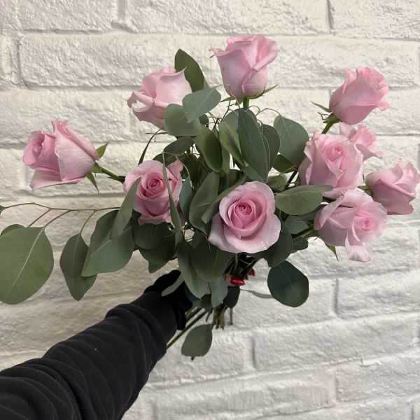 Bouquet of light pink roses with eucalyptus greenery