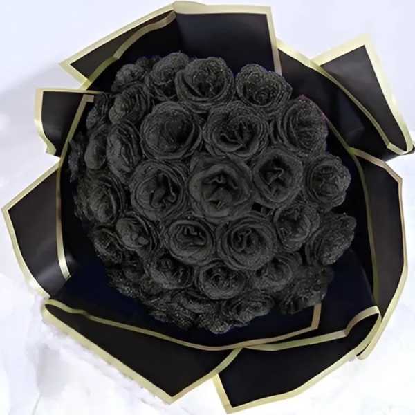 Bouquet of black roses wrapped in black paper with gold trim