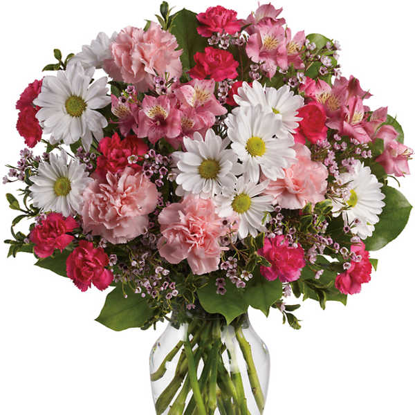 Pink and white mixed bouquet in a clear glass vase