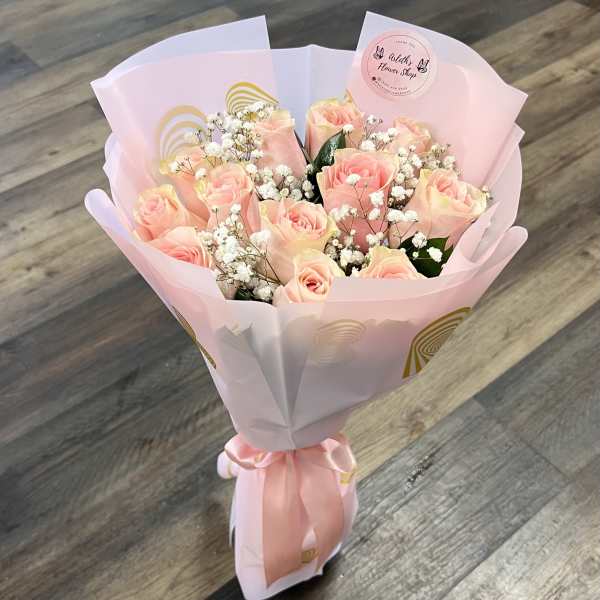 Dozen Light Pink Roses And Baby’s Breath