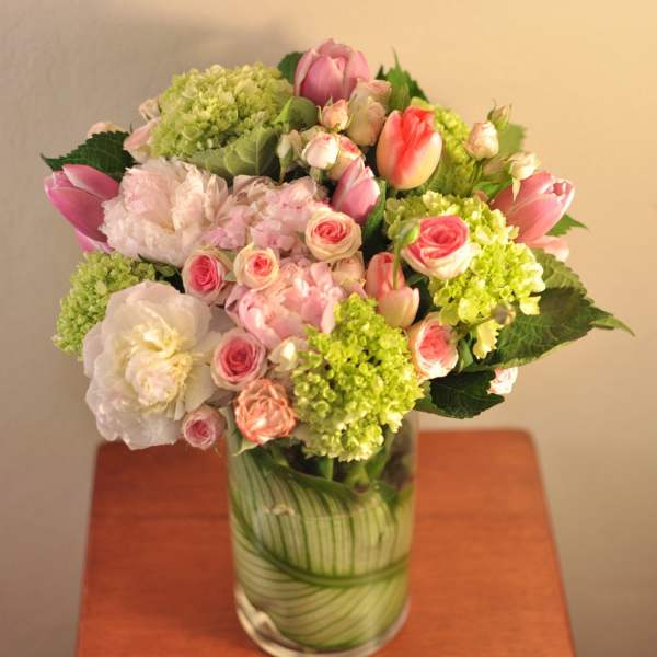 Pink and white mixed bouquet in a glass vase